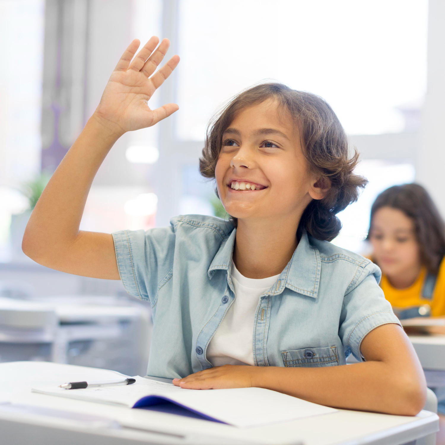 Tutor guiding a student during 11+ exam preparation