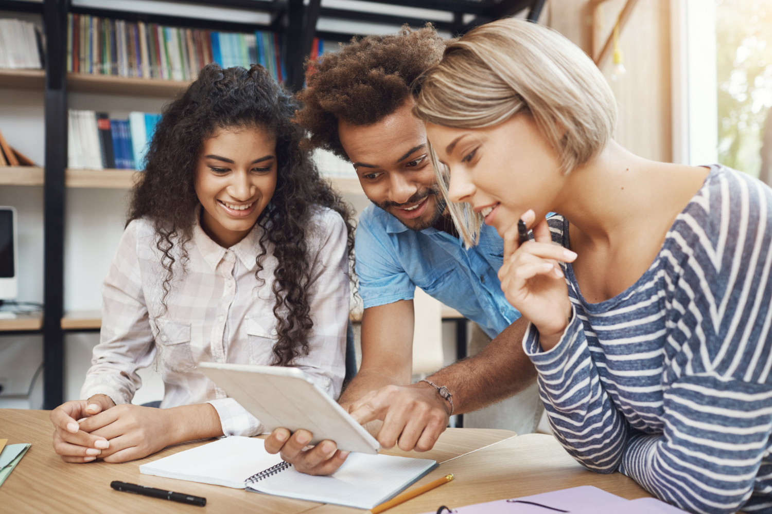 Students studying with learning materials
